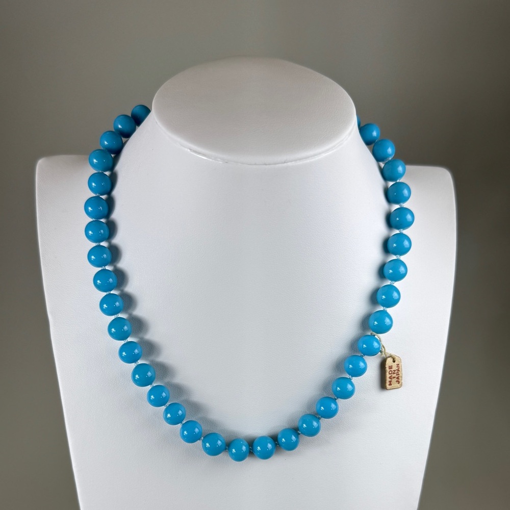 Vintage Sky Blue Knotted Necklace
12K GF filigree clasp
Newly strung/knotted